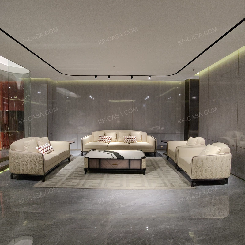 Cream Leather Sofa Set with Wave Quilted Craftsmanship, Natural Wood Veneer & Embroidered Wing Logo Accents